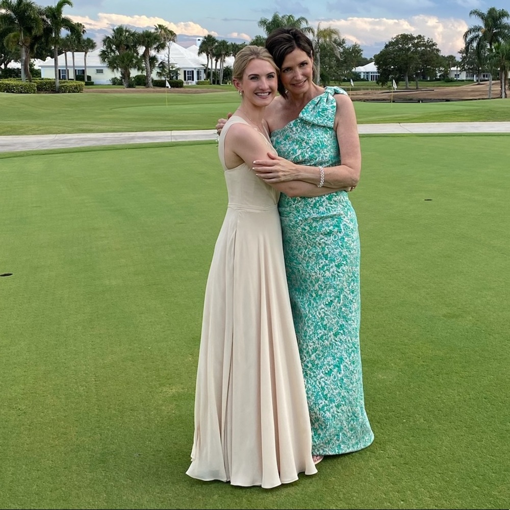 Gown by Teri Jon by Rickie Freeman.  Aqua/silver jacquard, forgiving and comfy